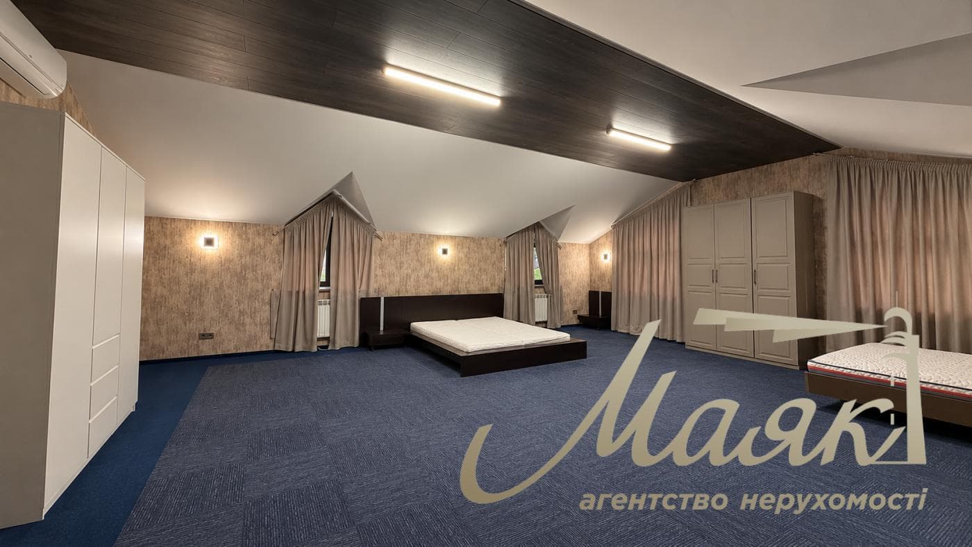 Оренда розкішного заміського будинку площею 1 217,2 м² у житловому комплексі «Південний» у с. Конча-Заспа/Козин, м. Київ, Голосіївський район, ділянка площею 40 соток