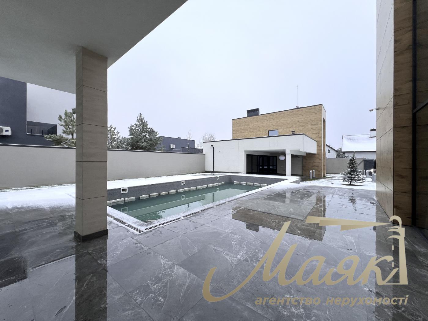 Оренда заміського будинку на Осокорках у котеджному містечку "Блакитна Лагуна"