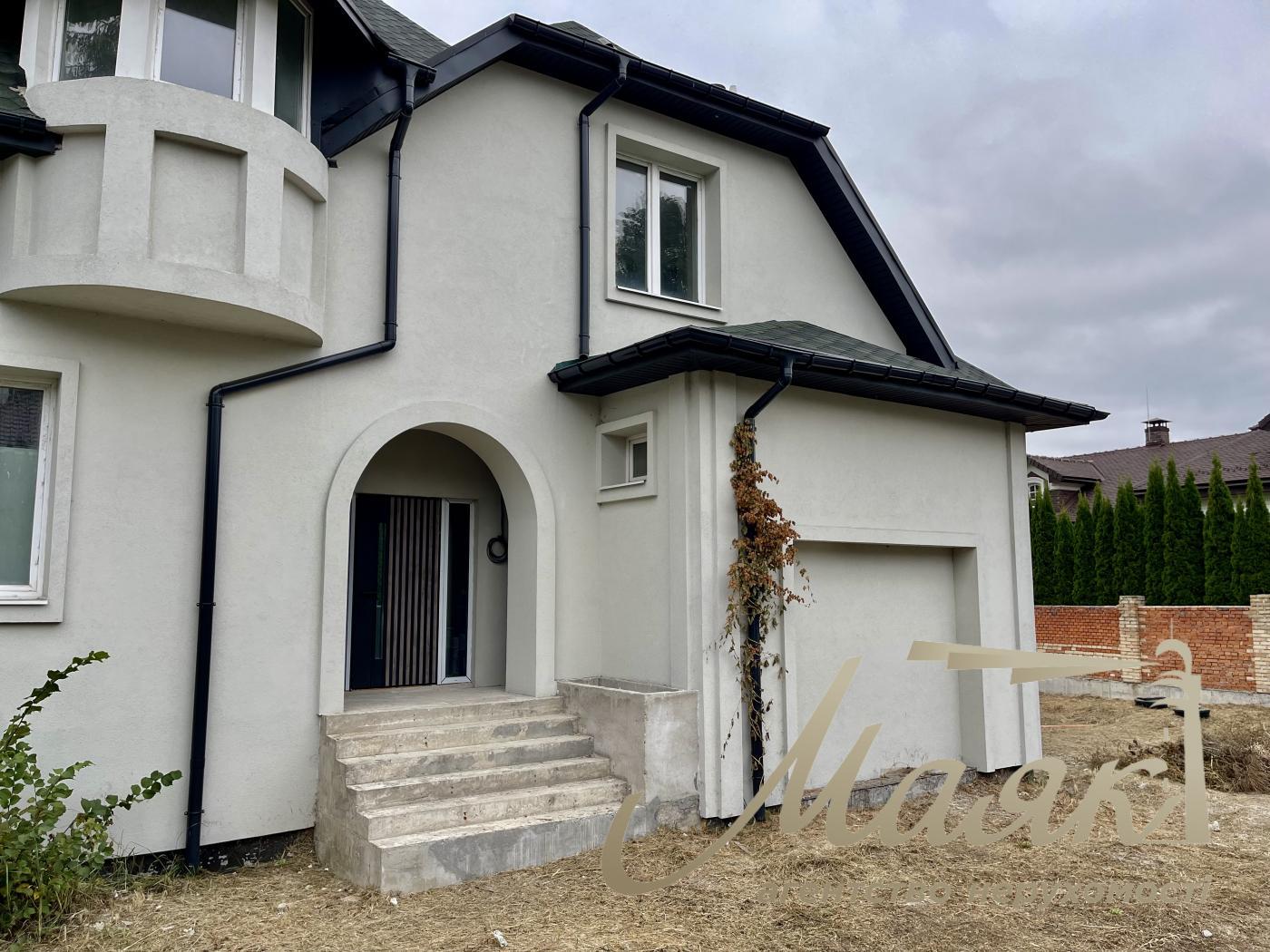 Продаж будинку з гаражем 365м2, ділянка 15 соток у КМ "ОБРІЙ - К" вул. Центральна, у с. Козин,