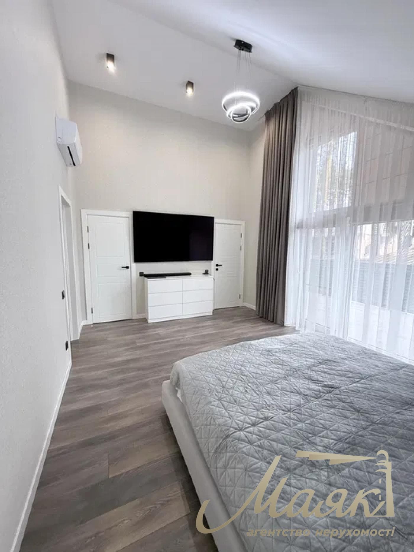 A stylish two-story house is for sale in a cozy wooded area in the village of Khodosivka—the perfect place for those who appreciate peace and quiet, nature, and the comforts of modern life.