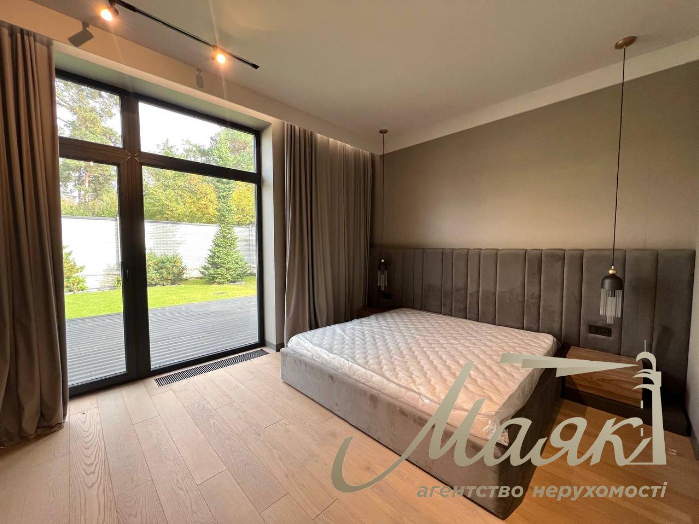 Modern one-storey house with swimming pool in Kozyń