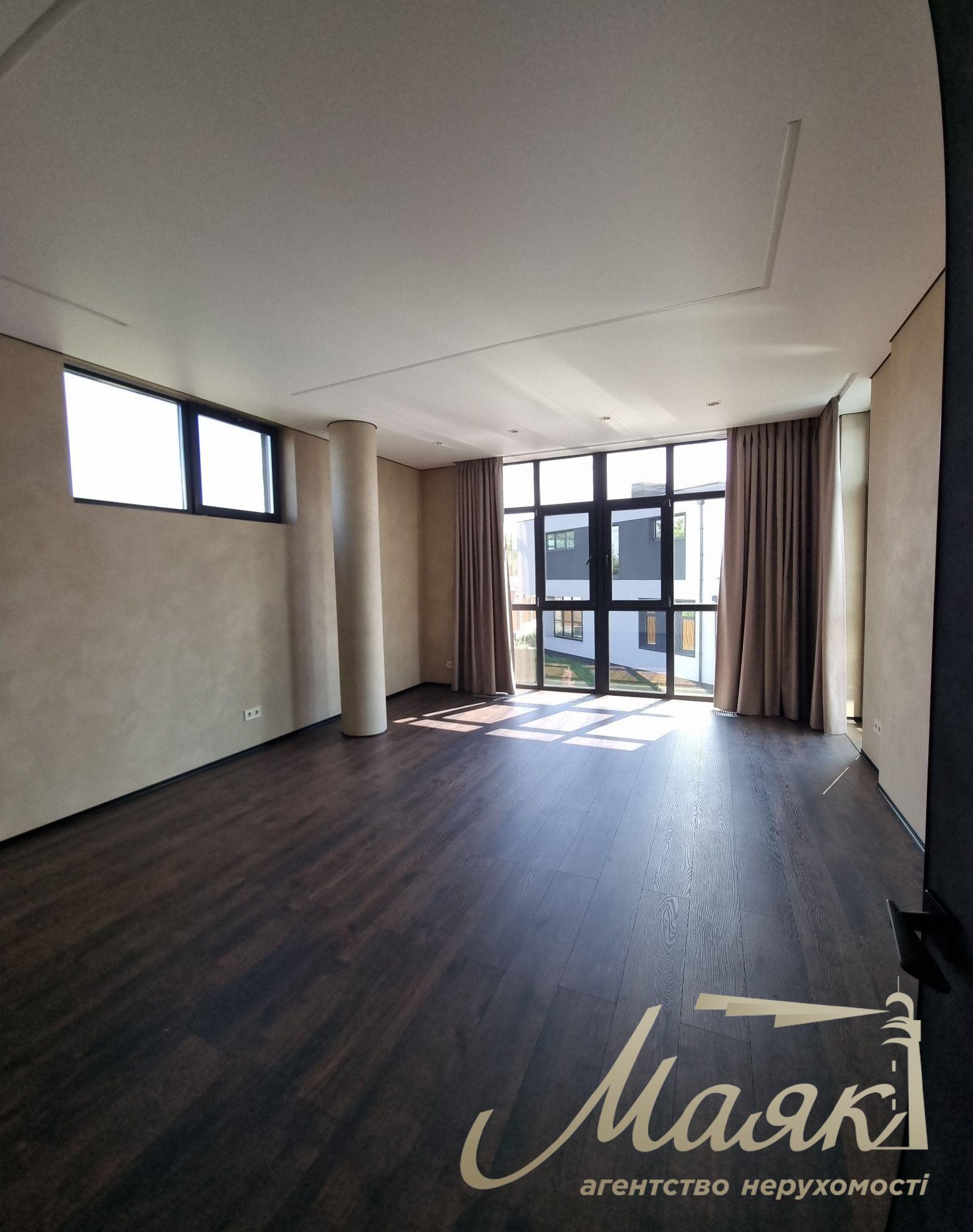 Продаж нового сучасного будинку в стилі Hi-Tech у селі Гатне