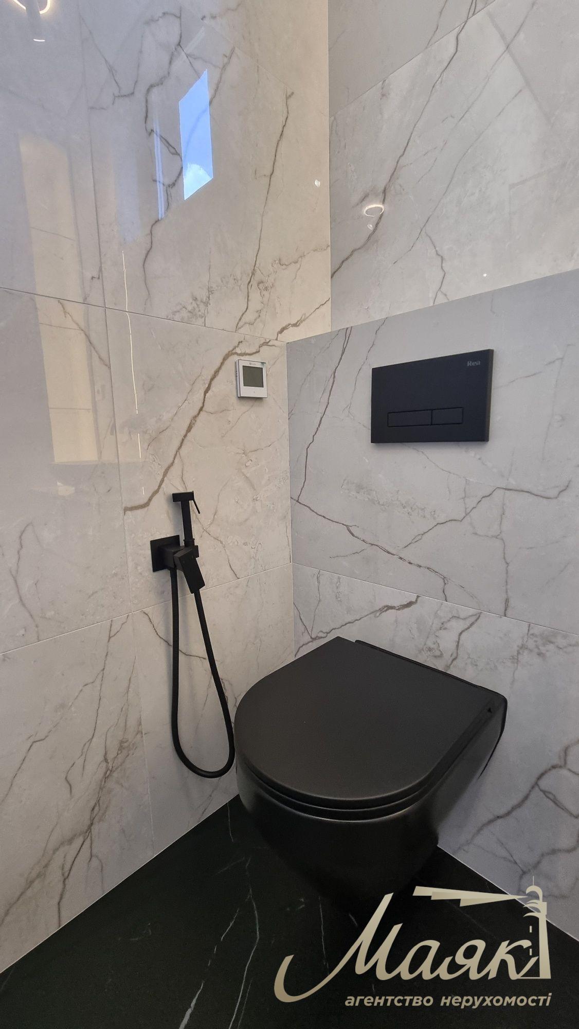 Продаж нового сучасного будинку в стилі Hi-Tech у селі Гатне