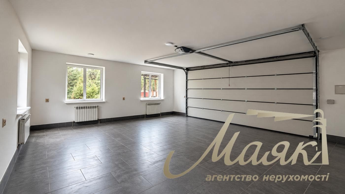 Оренда розкішного заміського будинку площею 1 217,2 м² у житловому комплексі «Південний» у с. Конча-Заспа/Козин, м. Київ, Голосіївський район, ділянка площею 40 соток