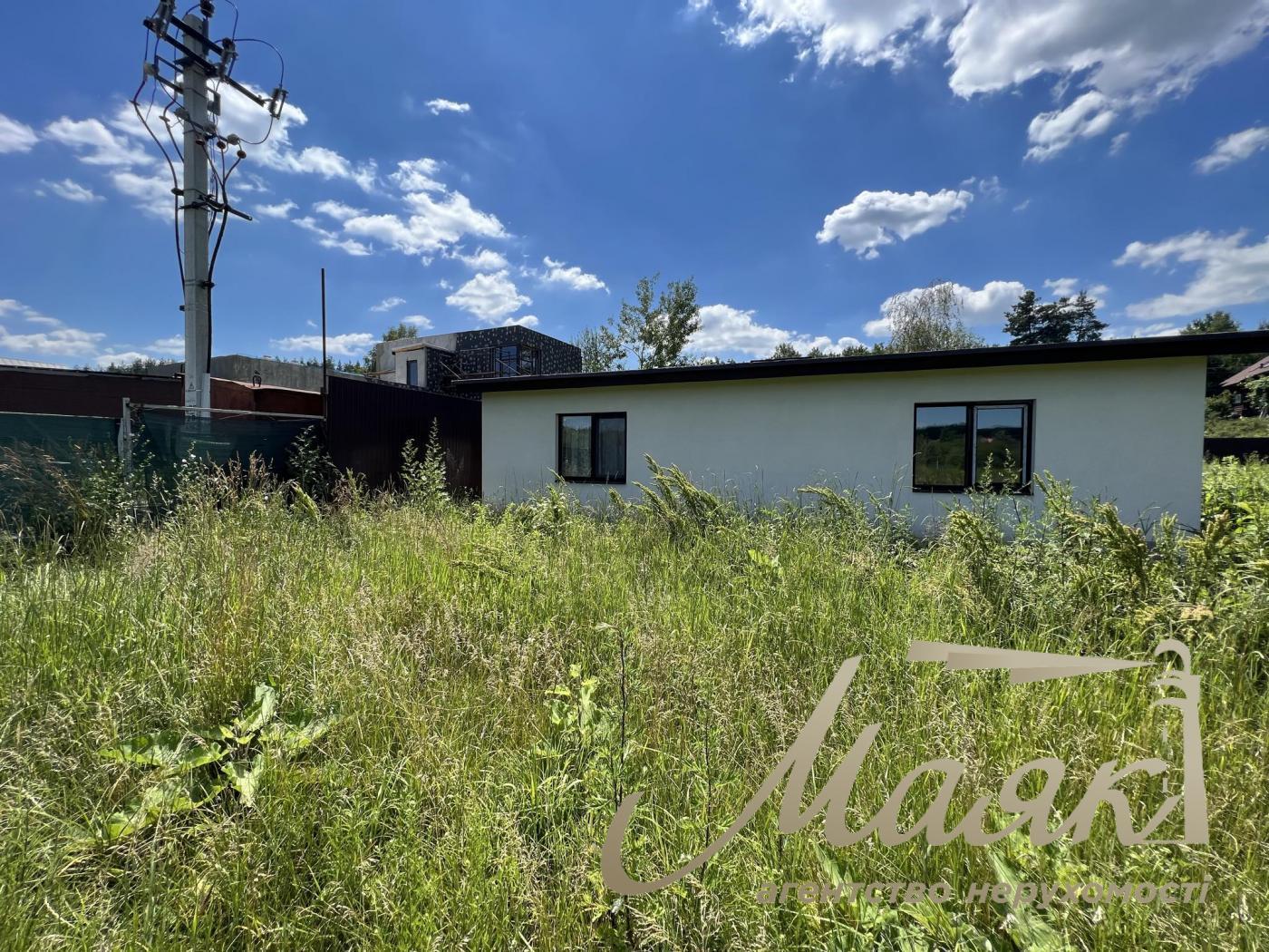 Sale of land with a lake and forest in the village of Khodosovka