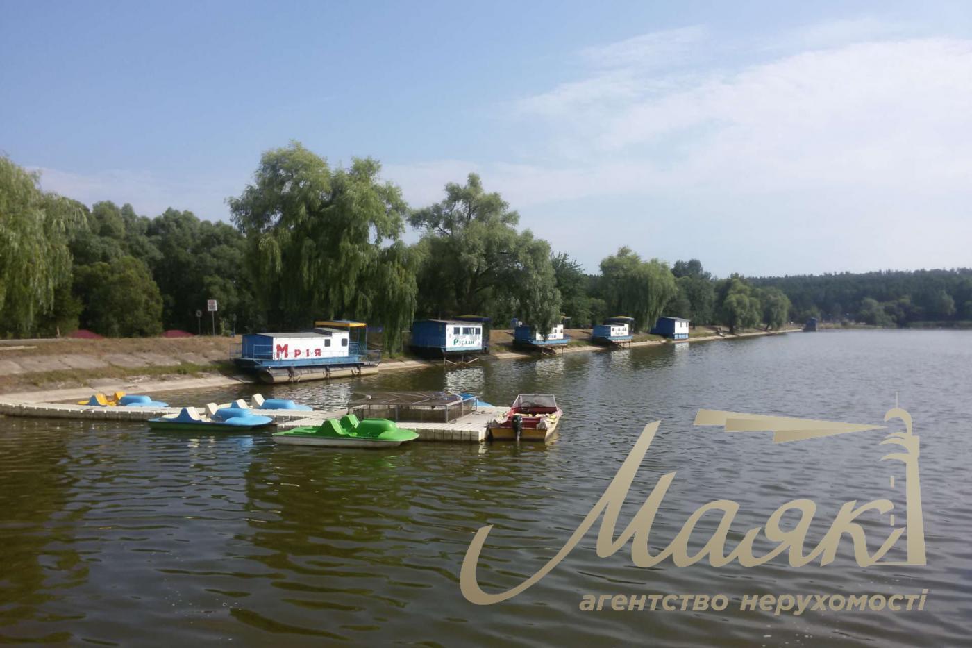 Sale of land for individual construction in a town in the forest.