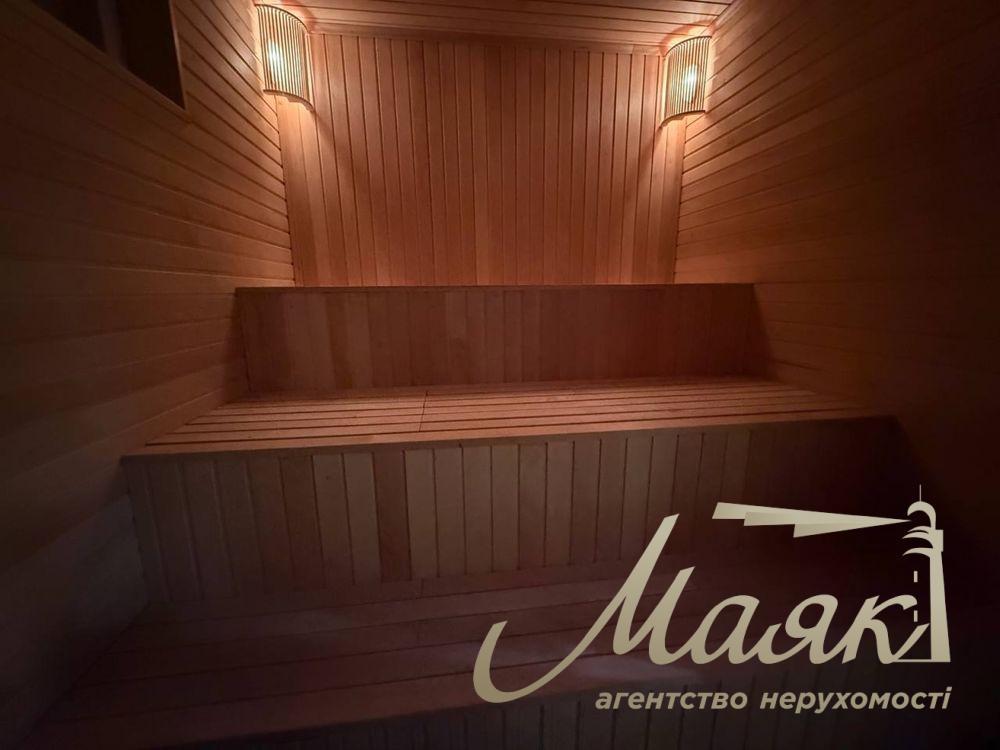 Продаж нового будинку загальною площею 275 м² на доглянутій ділянці 8,7 соток с. Гореничі