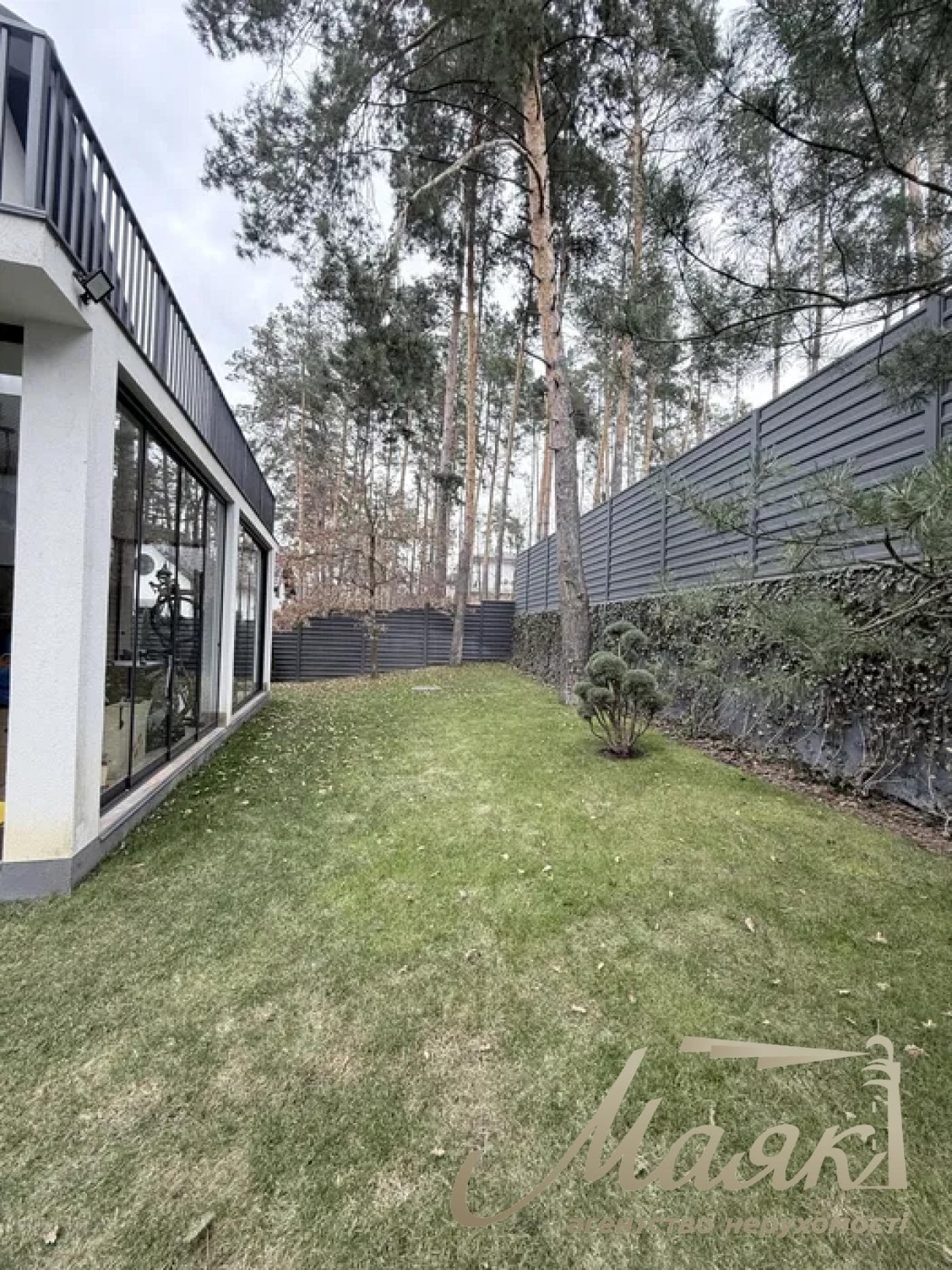 A stylish two-story house is for sale in a cozy wooded area in the village of Khodosivka—the perfect place for those who appreciate peace and quiet, nature, and the comforts of modern life.