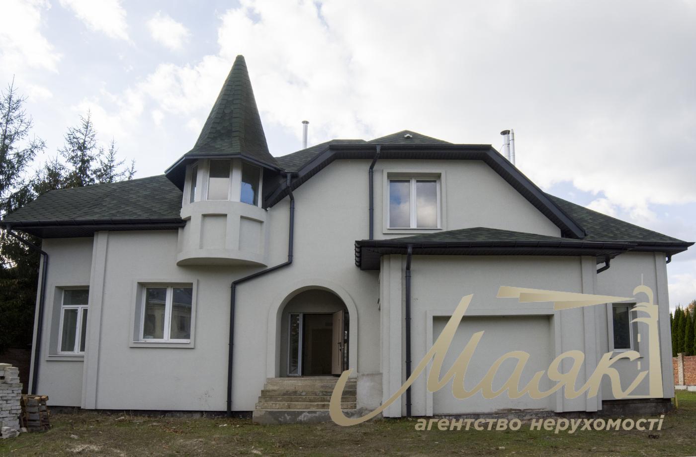 Продаж будинку з гаражем 365м2, ділянка 15 соток у КМ "ОБРІЙ - К" вул. Центральна, у с. Козин,