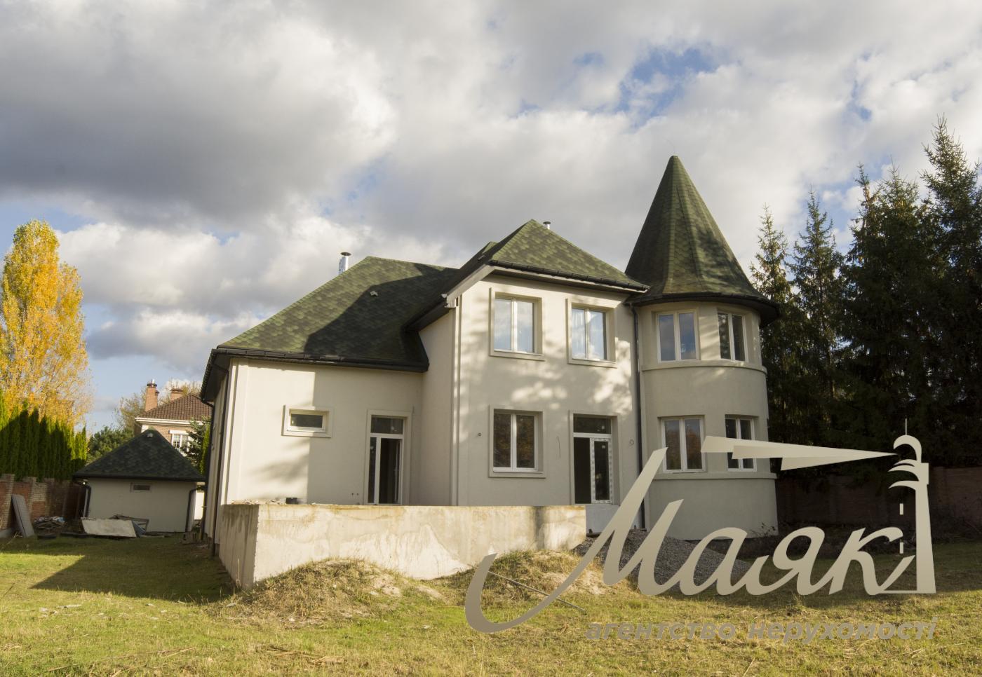 Продаж будинку з гаражем 365м2, ділянка 15 соток у КМ "ОБРІЙ - К" вул. Центральна, у с. Козин,