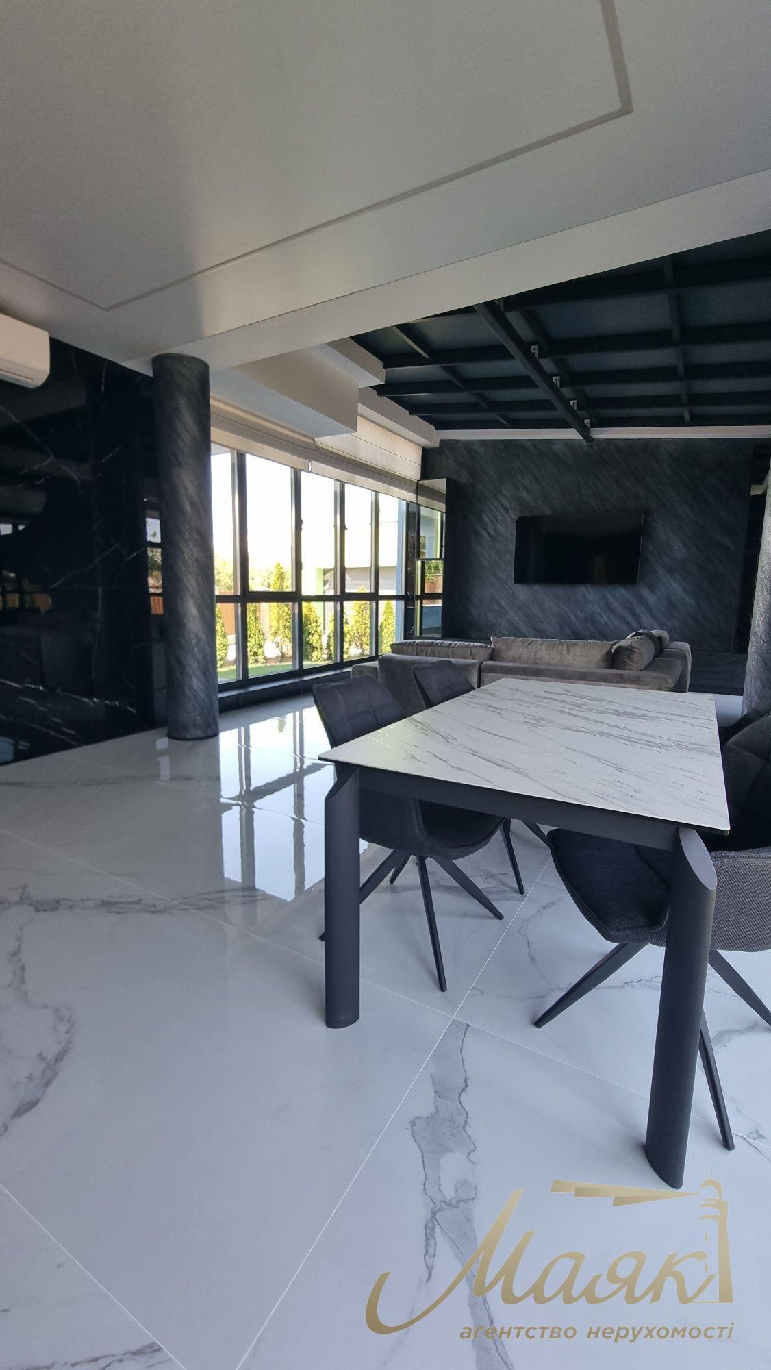 Продаж нового сучасного будинку в стилі Hi-Tech у селі Гатне