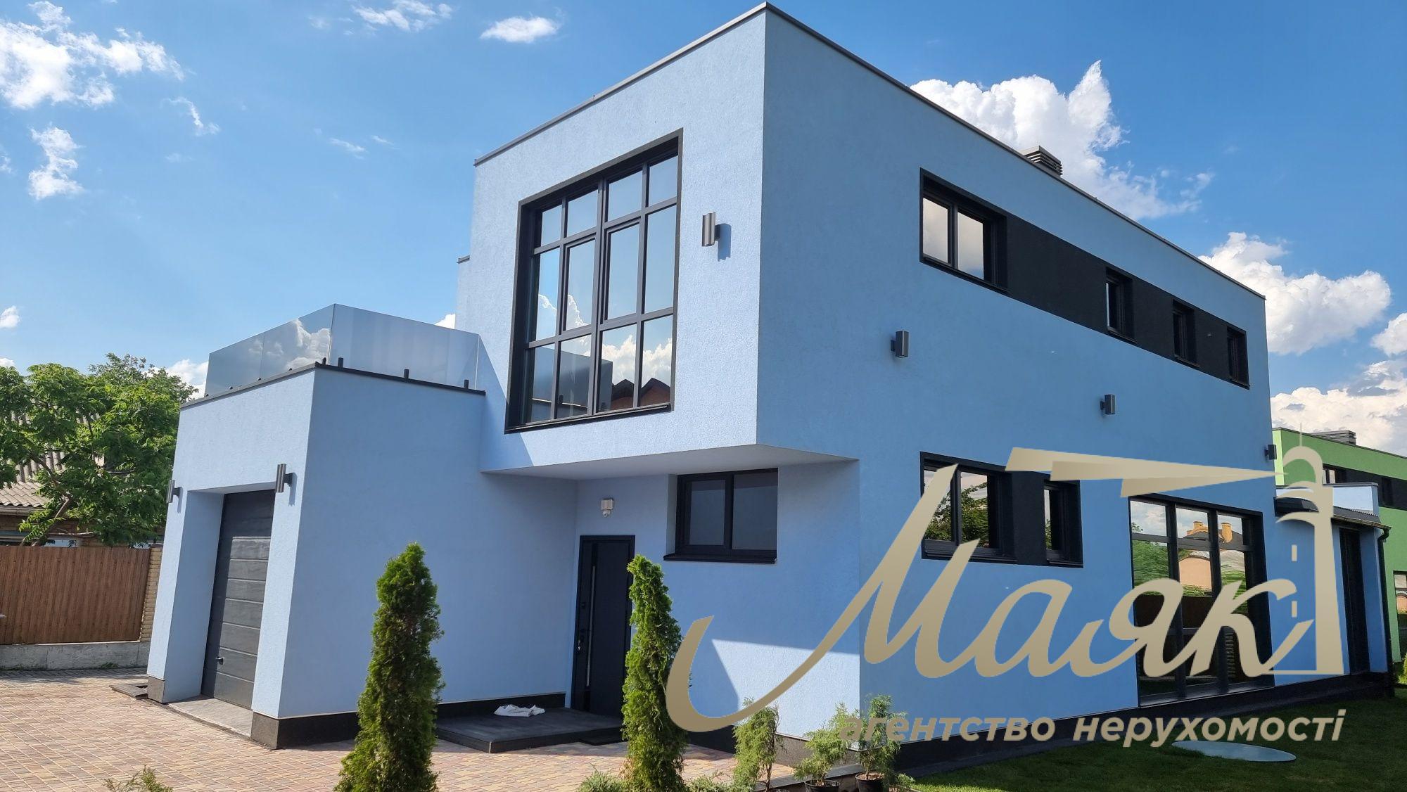 Продаж нового сучасного будинку в стилі Hi-Tech у селі Гатне