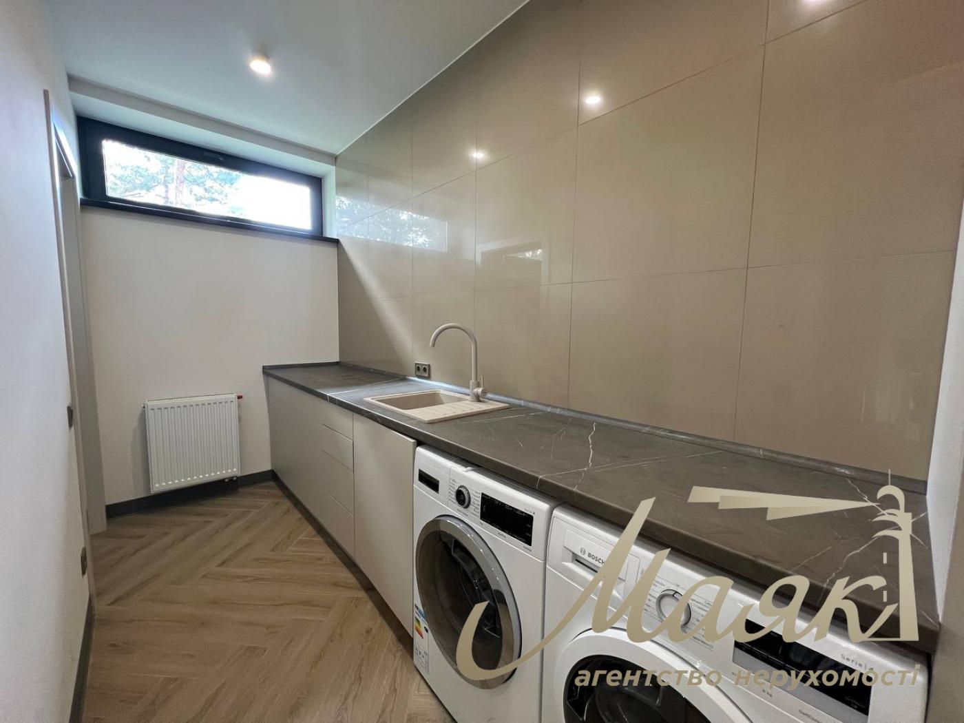 Modern one-storey house with swimming pool in Kozyń