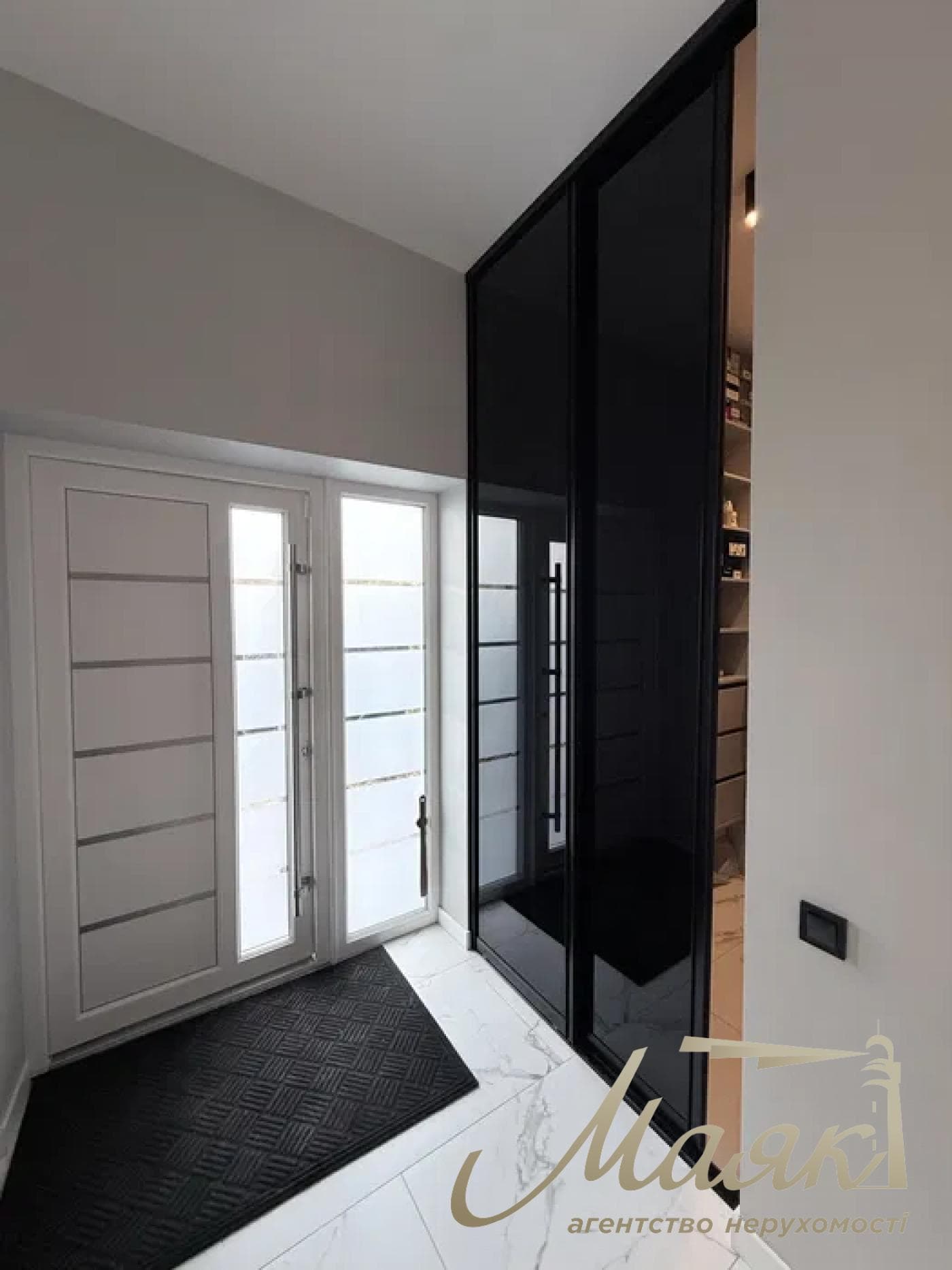 A stylish two-story house is for sale in a cozy wooded area in the village of Khodosivka—the perfect place for those who appreciate peace and quiet, nature, and the comforts of modern life.