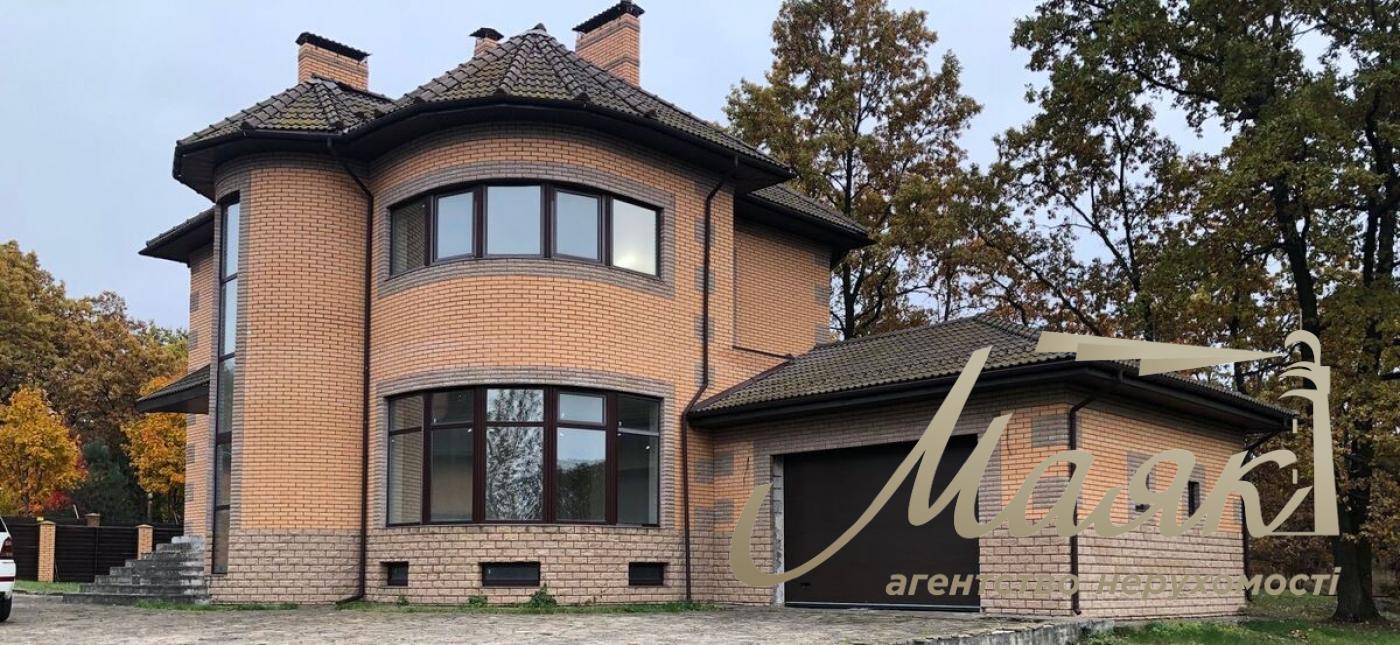 Продаж будинку 356м2 у Романкові з ділянкою 21 сотка