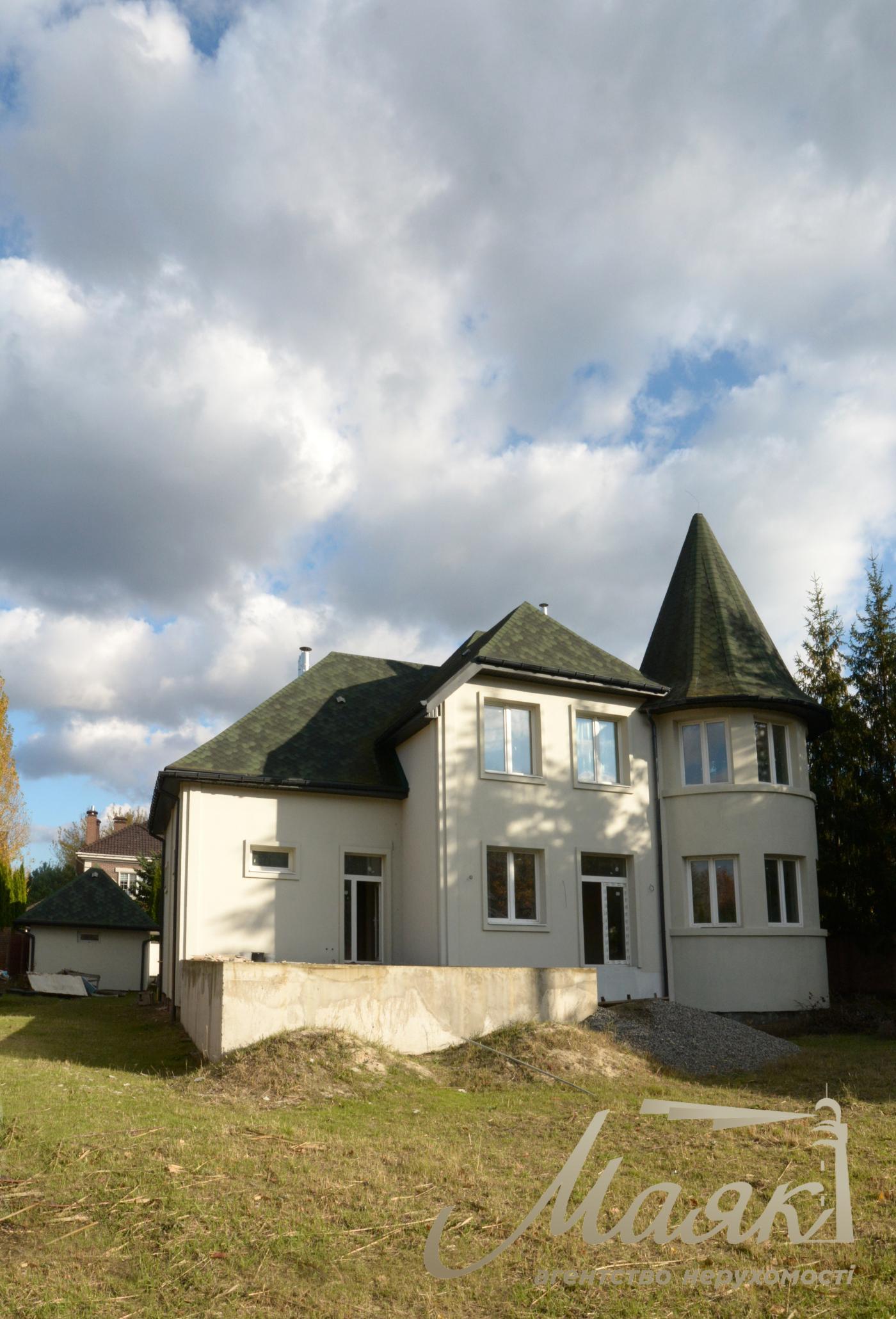 Продаж будинку з гаражем 365м2, ділянка 15 соток у КМ "ОБРІЙ - К" вул. Центральна, у с. Козин,