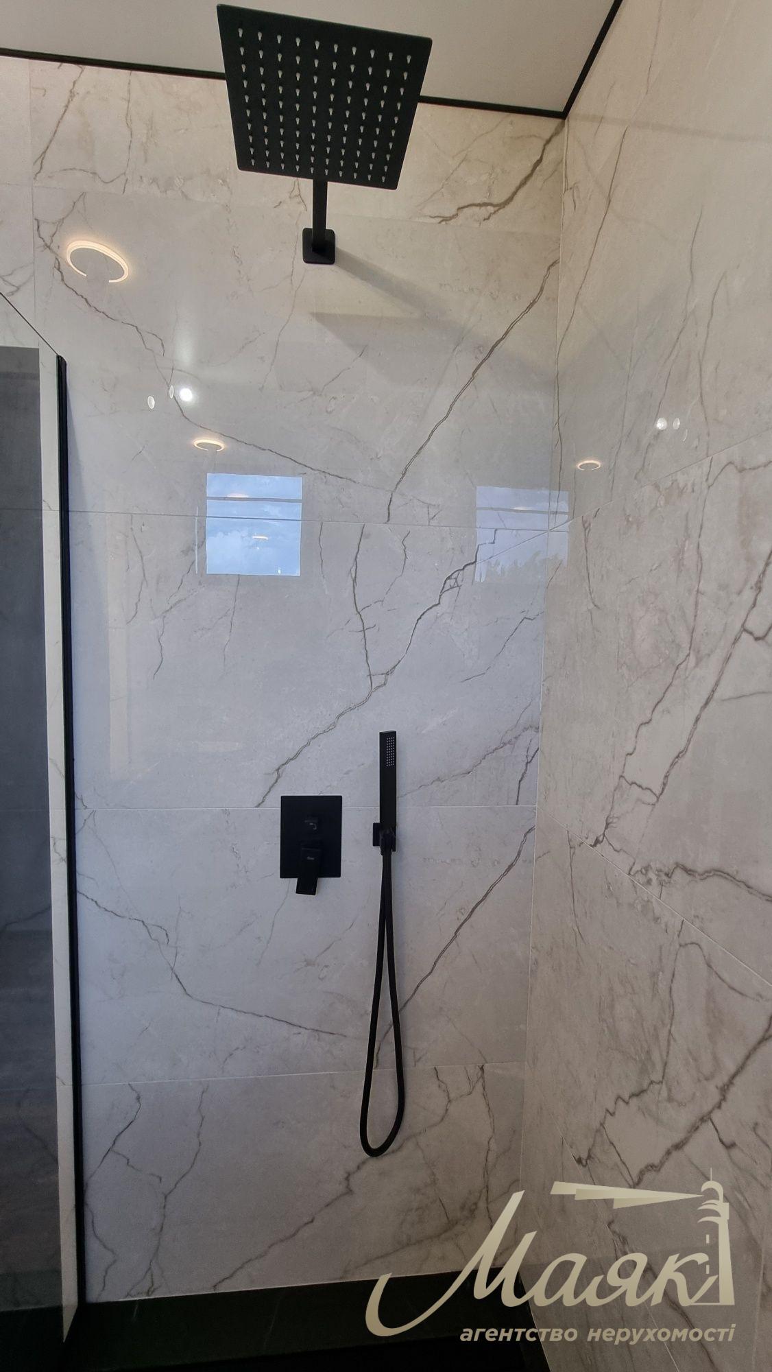 Продаж нового сучасного будинку в стилі Hi-Tech у селі Гатне