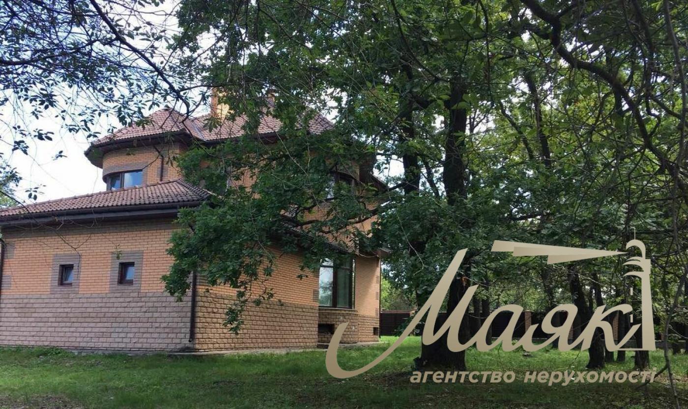 Продаж будинку 356м2 у Романкові з ділянкою 21 сотка