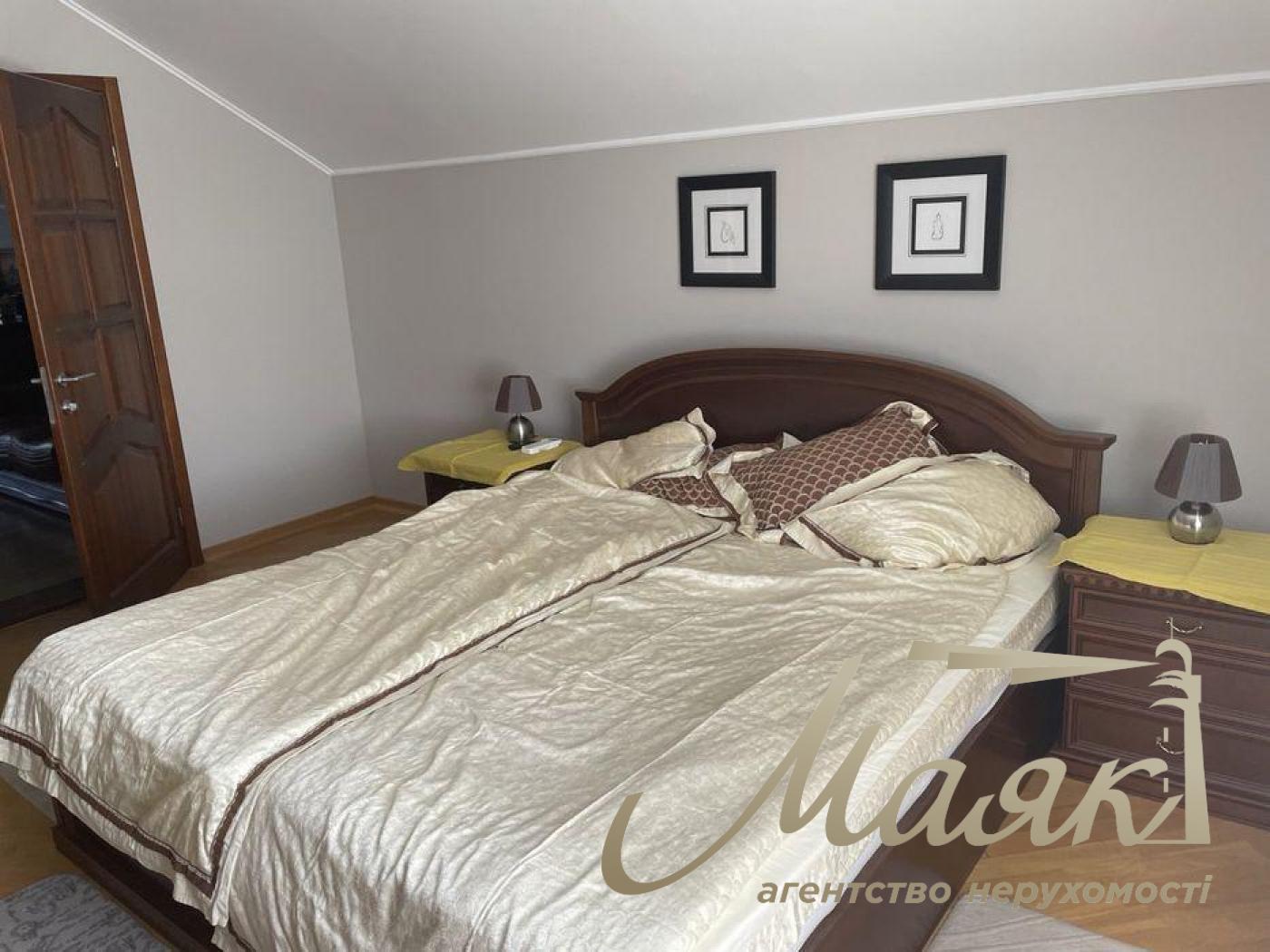 Sale of a 2-storey house in Rudyki. House area 254 sq. m. Plot 18 acres.