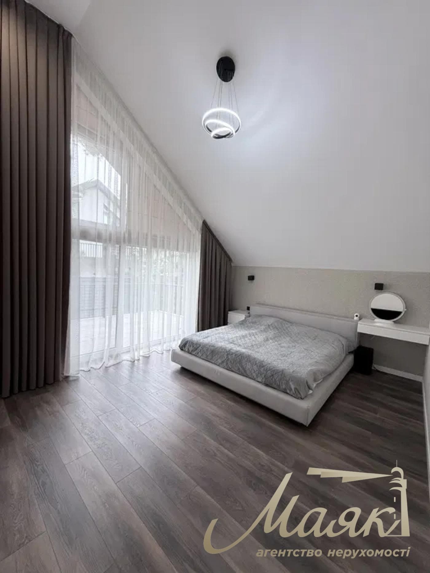 A stylish two-story house is for sale in a cozy wooded area in the village of Khodosivka—the perfect place for those who appreciate peace and quiet, nature, and the comforts of modern life.