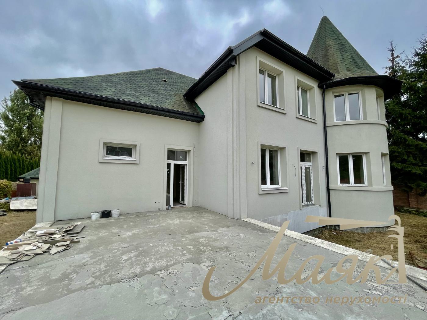 Продаж будинку з гаражем 365м2, ділянка 15 соток у КМ "ОБРІЙ - К" вул. Центральна, у с. Козин,