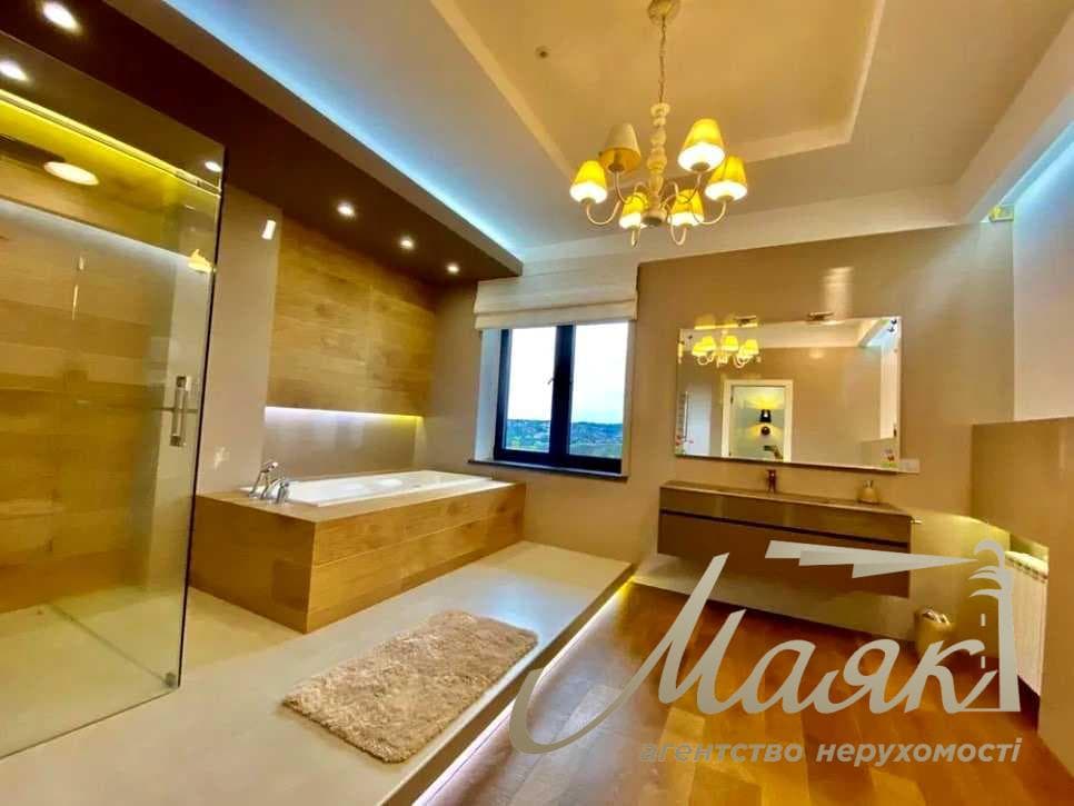 Оренда будинку площею 370 м² у закритому котеджному містечку «Лісники» — авторський дизайн, 15 соток та гараж на 2 автомобілі, вул. Гайова