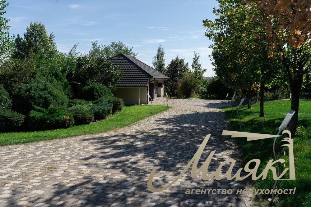 Продаж будинку з басейном 587м2 у с.Ходосівка, Новообухівський напрямок, Київська область.