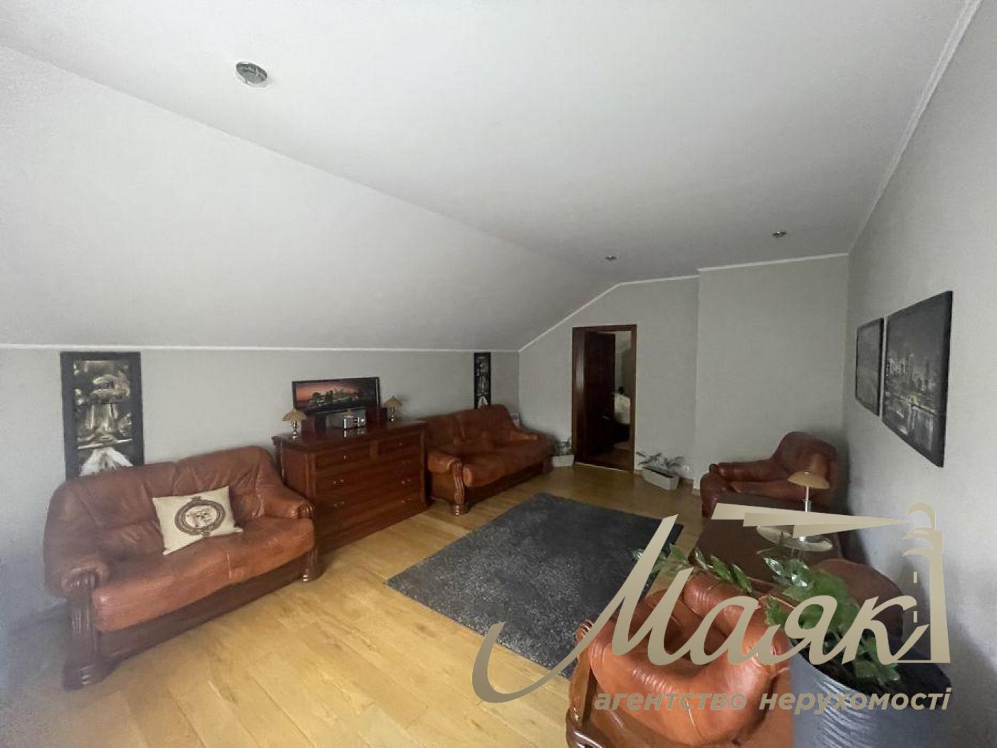 Sale of a 2-storey house in Rudyki. House area 254 sq. m. Plot 18 acres.