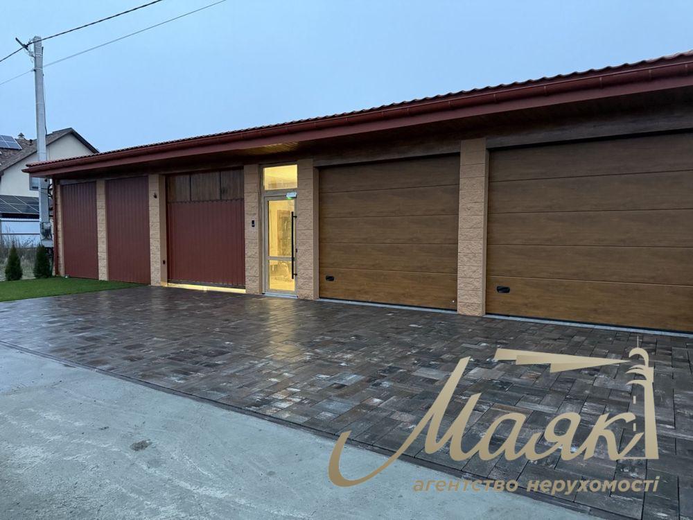 Продаж нового будинку загальною площею 275 м² на доглянутій ділянці 8,7 соток с. Гореничі